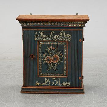 A Swedish painted cabinet from Hälsingland, dated 1831.
