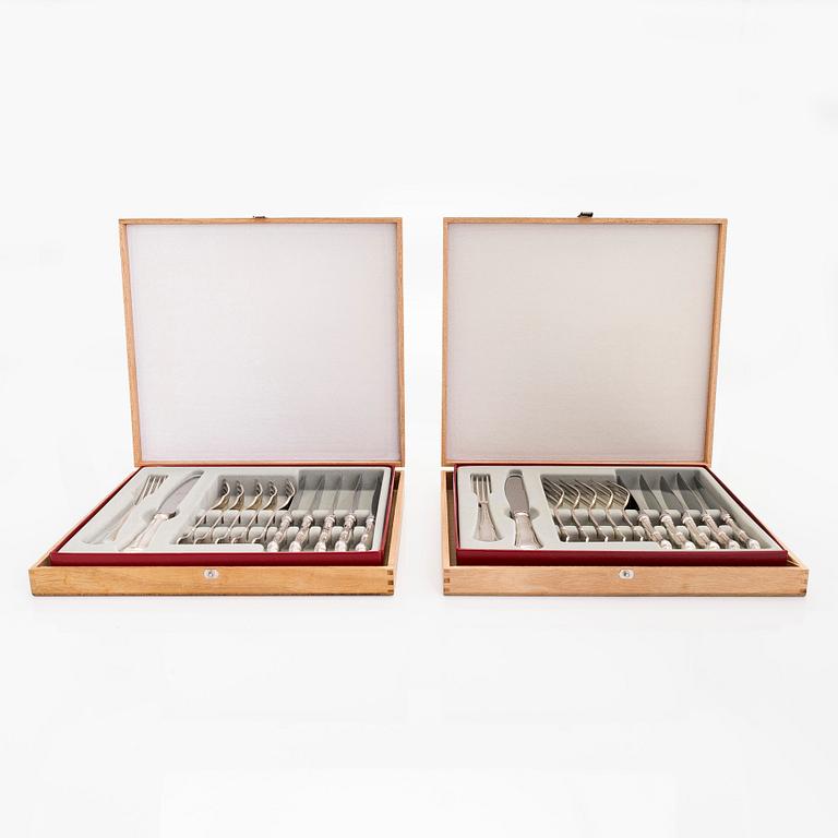 A 24-piece silver 'Chippendale' cutlery set, KPL, Finland 1998. In two original wooden boxes.