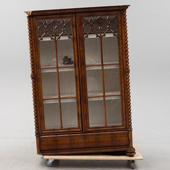 A mahogany veneered Gothic Revival cabinet, second half of the 19th Century.