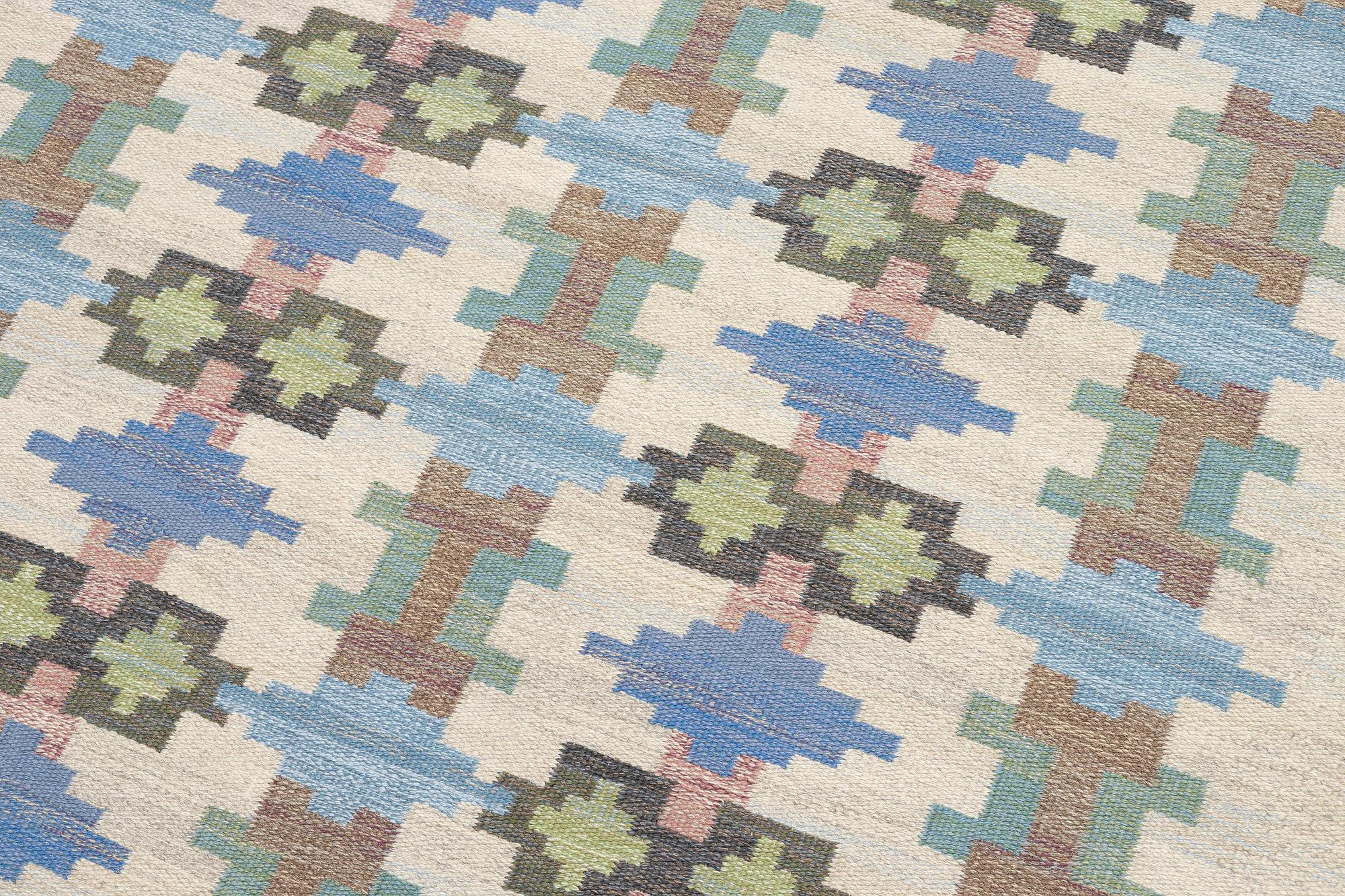 Judith Johansson, a carpet 'Riddarsporrar', flat weave, c. 245 x 177 cm, signed JJ E.