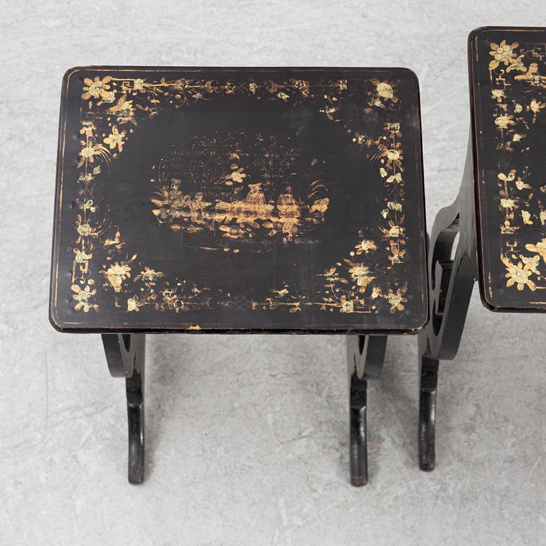 A lacquered nesting table, around 1900.