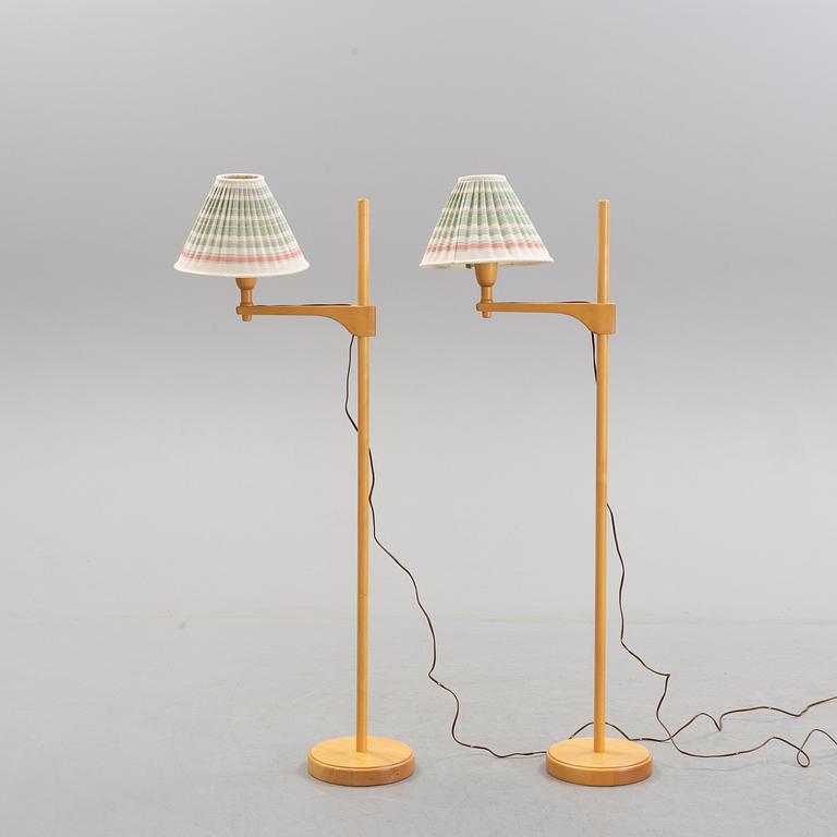 CARL MALMSTEN, a pair of birch 'Staken' standard lights.