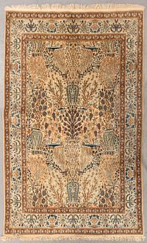 A semiantique part silk nain carpet ca 265 x 163 cm.