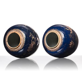 A pair of blue glazed Chinese jars with covers, Qing dynasty, Qianlong (1736-95).