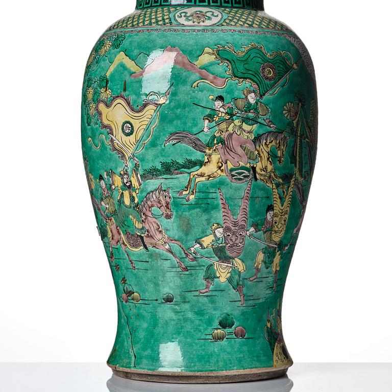 A massive famille verte bisquit vase, Qing dynasty with Kangxi mark to base.