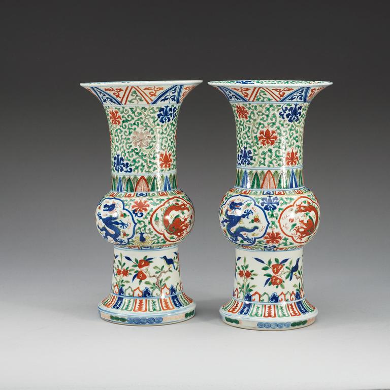 A pair of wucai vases, presumably 20th Century with Wanli six character mark.