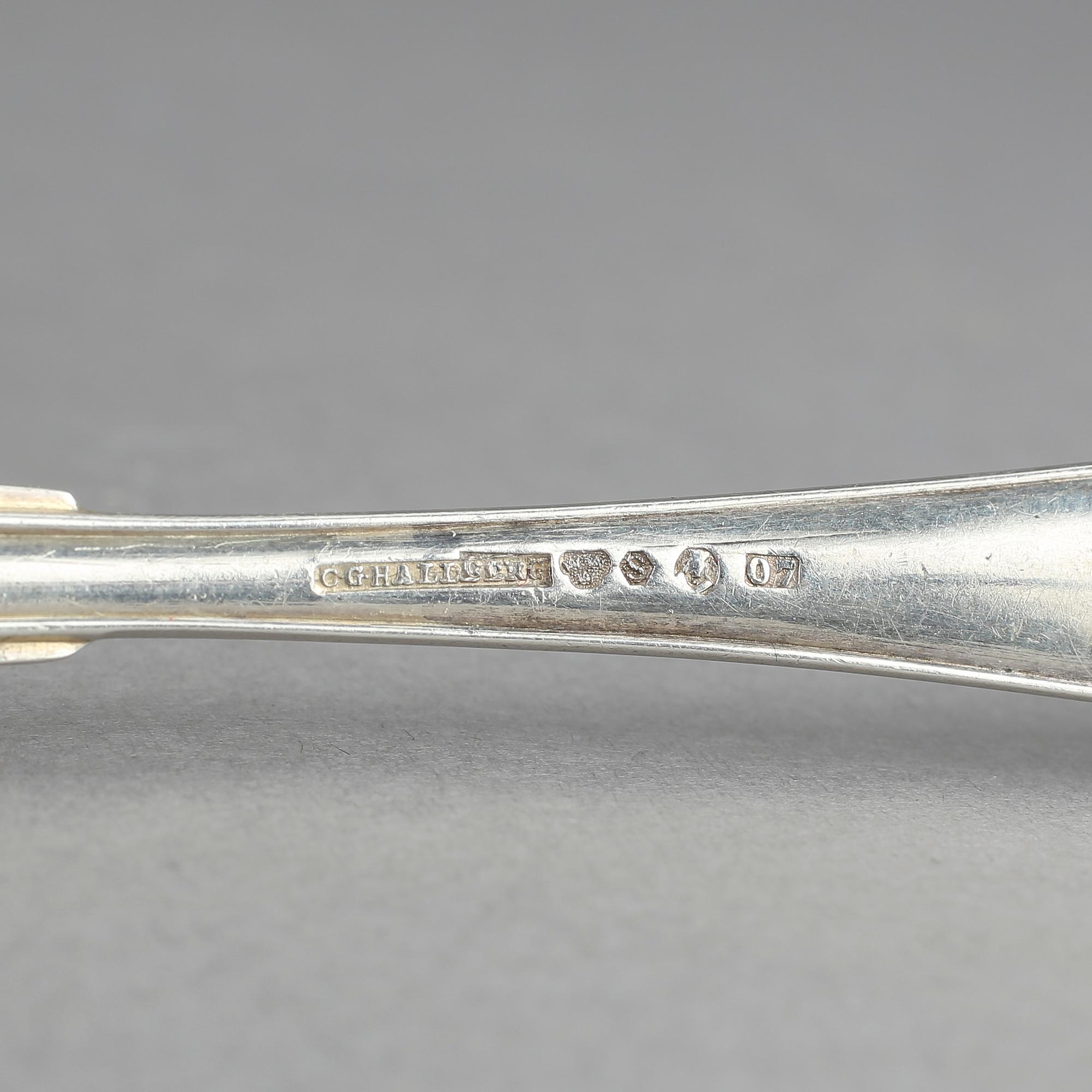 BESTICK, 12 st, silver, modell svensk spets. Tot vikt ca 495 g.