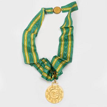 An 18K gold medal, Sporrong, Stockholm 1958.