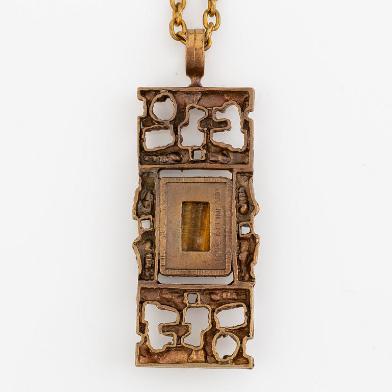 Pentti Sarpaneva, Collier,brons med tigeröga. Möjligen Pentti Sarpaneva,
