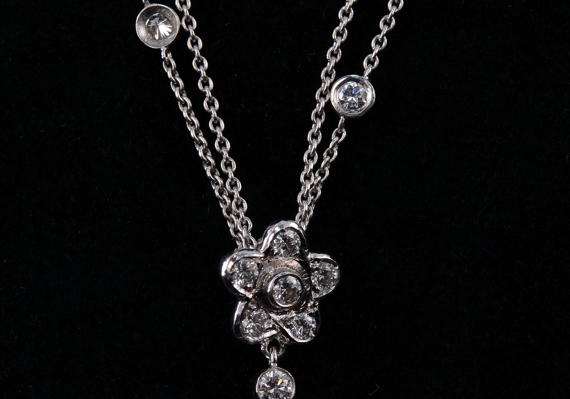 A NECKLACE, brilliant- and drop cut diamonds c. 2.56 ct. 18K white gold, weight 11 g.