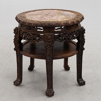 A Chinese hardwood table, around 1900.