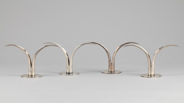 256212. LJUSSTAKAR, 4 st, nysilver, "Liljan", Ivar Ålenius Björk, Ystad metall, 1900-tal.