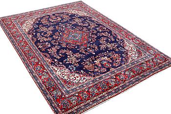 A Persian carpet, c. 319 x 212 cm.