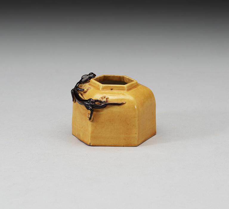 A yellow and brown glazed brush washer with curling dragon, Qing dynasty, 19th Century, with Xuande four character mark.