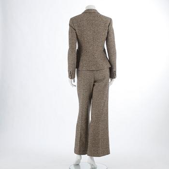 MAX MARA, a wool and silk a two-picee suit consisting of jacket and pants, size 38 and 42.