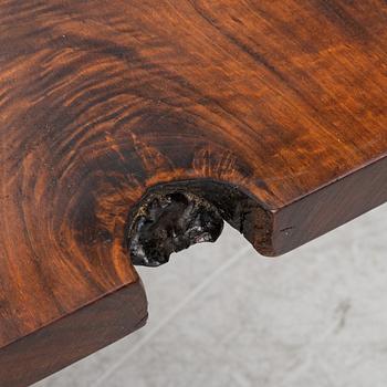 A walnut slab table.