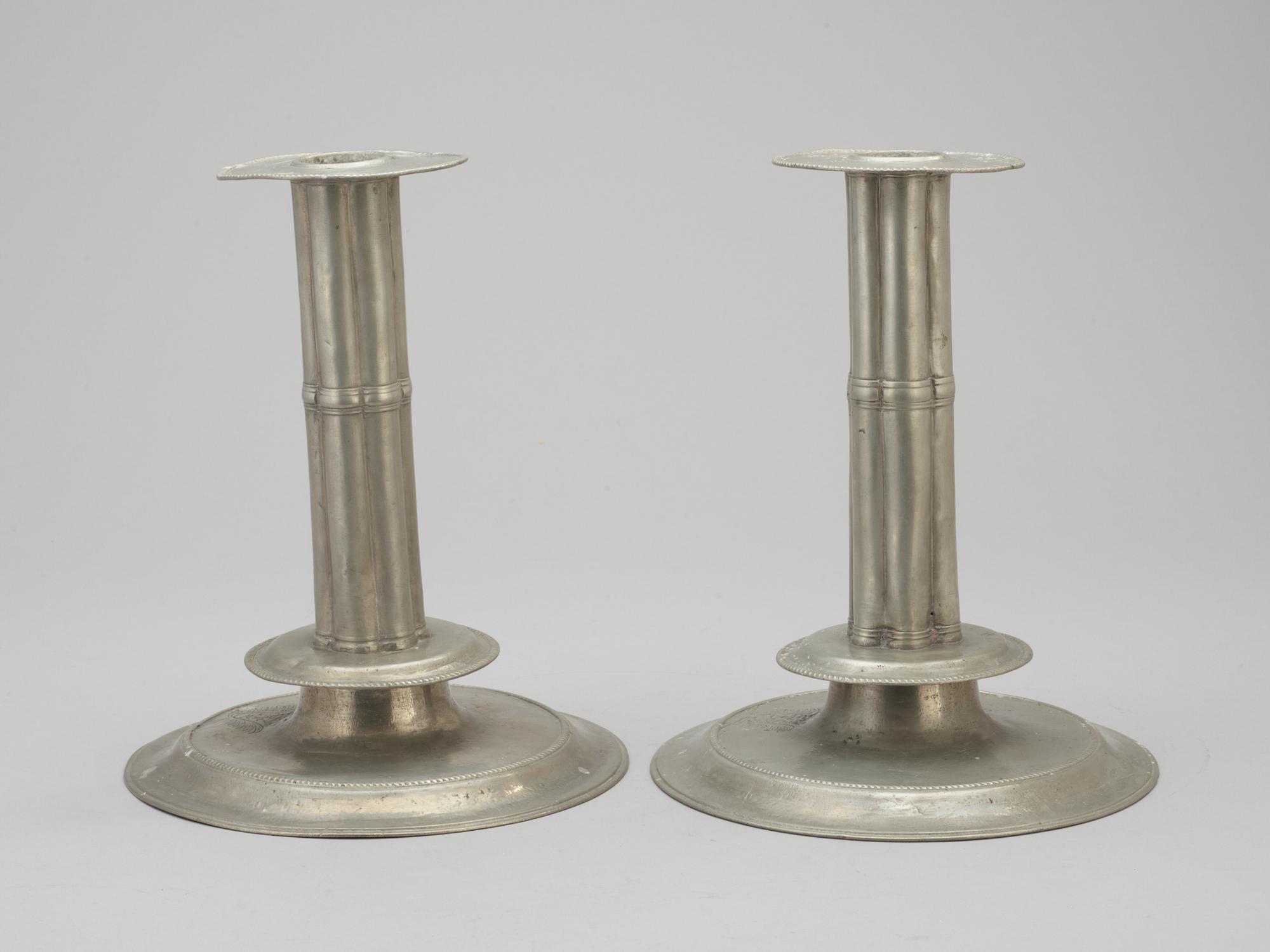 A pair of English Baroque pewter candlesticks by Francis Lea (-1675) London.