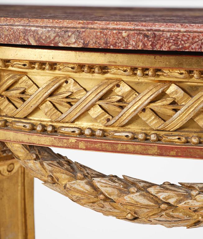 A Gustavian carved giltwood and marble console table, Stockholm, late 18th century.