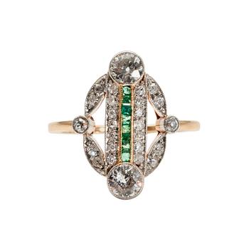 415. A RING, 14K gold. Old cut diamonds c. 1.75 ct, emeralds. Size 17,5. Weight 3.8 g.