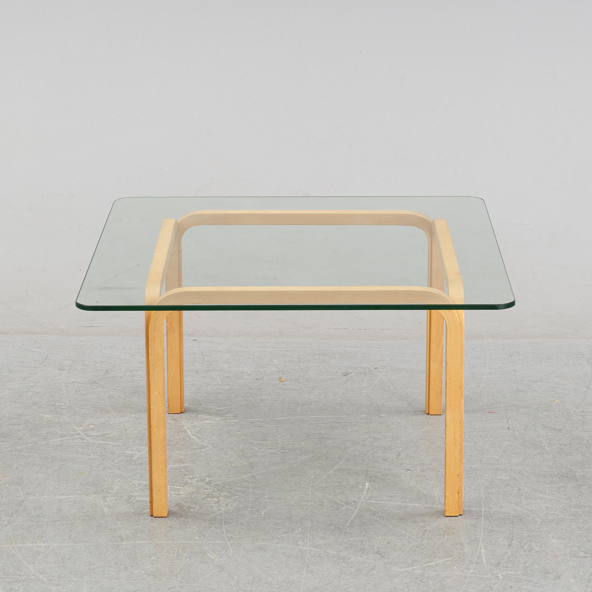 A model Y 805 glass and birch coffee table by Alvar Aalto, second half of  the 20th Century.
