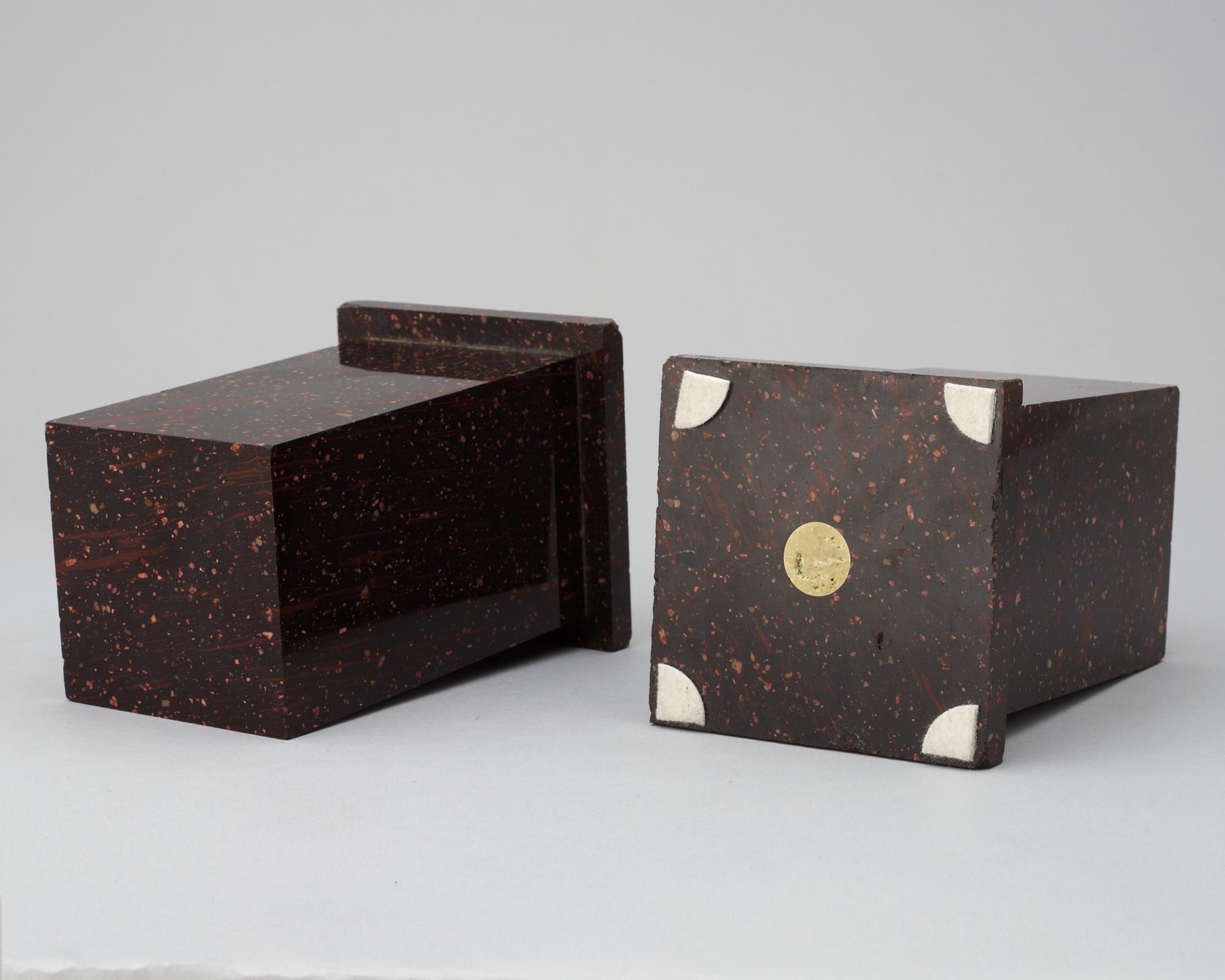 A pair of Swedish 19th century porphyry bases.