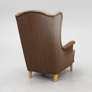 Carl Malmsten, an 'Åldermannen' armchair, second half of the 20th Century.