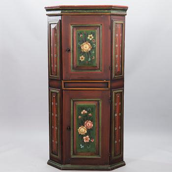 A rustic corner cabinet, 18/19th century.