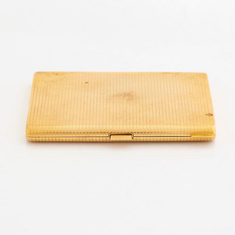 18K gold cigarette case.