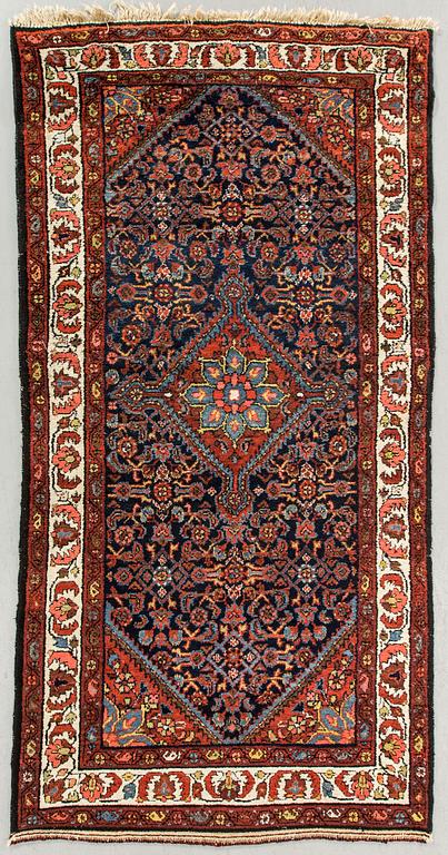 A semiantique Hamadan carpet ca 210 x 110 cm.