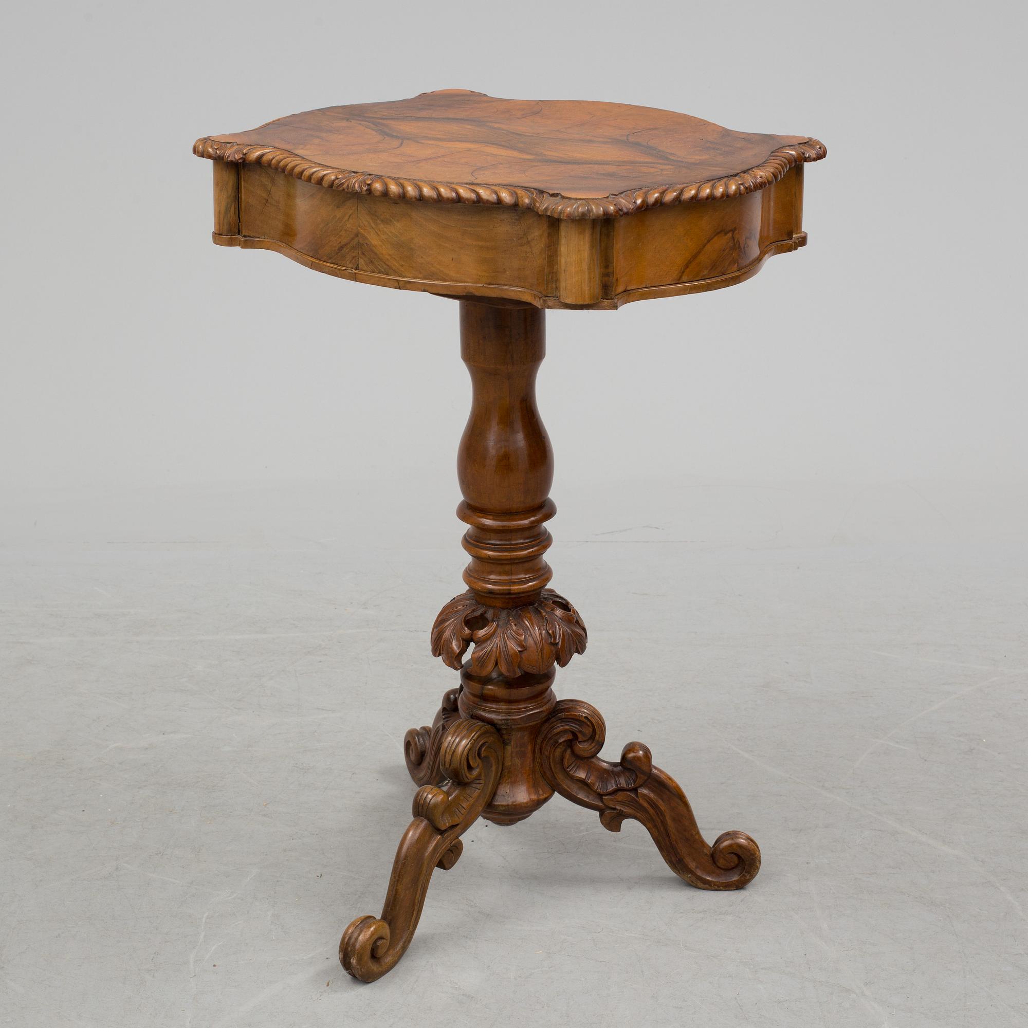 A mid 19th century sewing table.