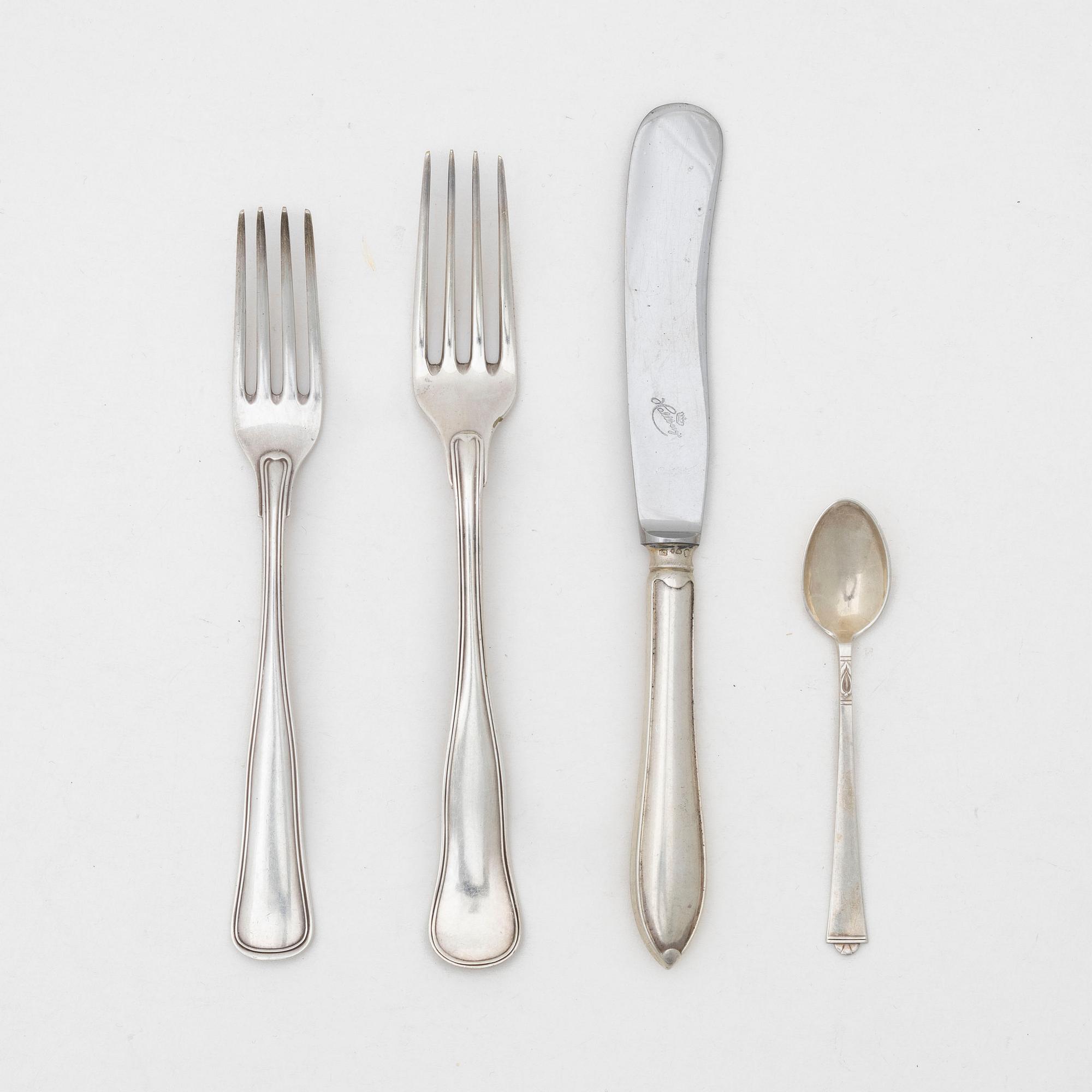 21 pieces of silver cutlery, 20th century.