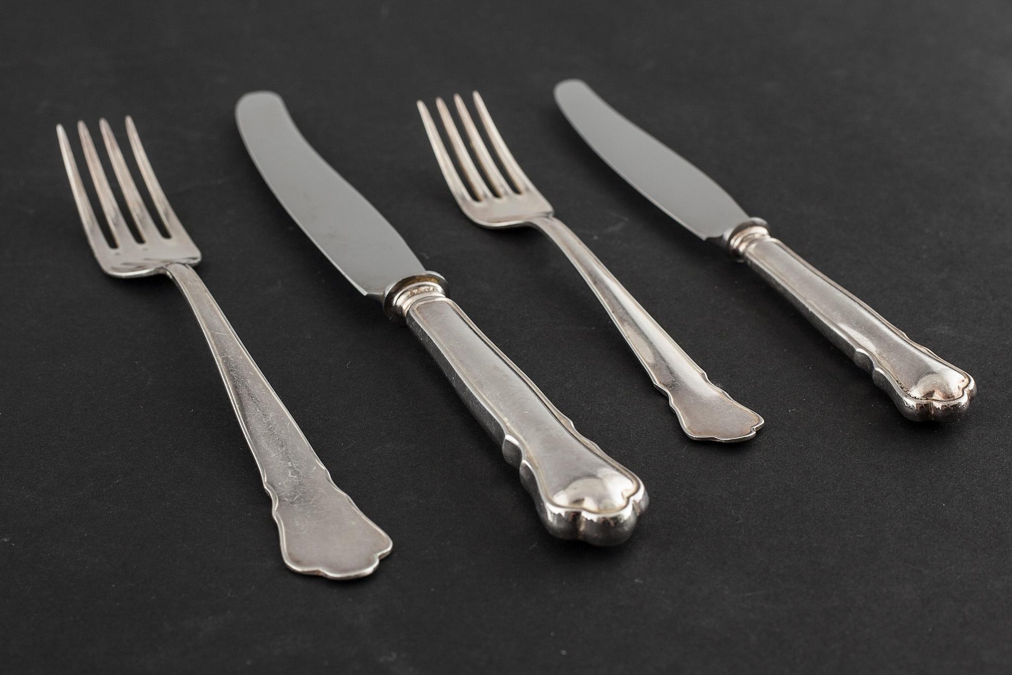 A mid 20th century silver tablewear set of 48 pc, "Chippendale" by GAB.