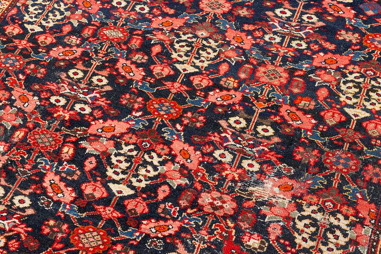 A Farahan carpet, c. 520 x 205 cm.