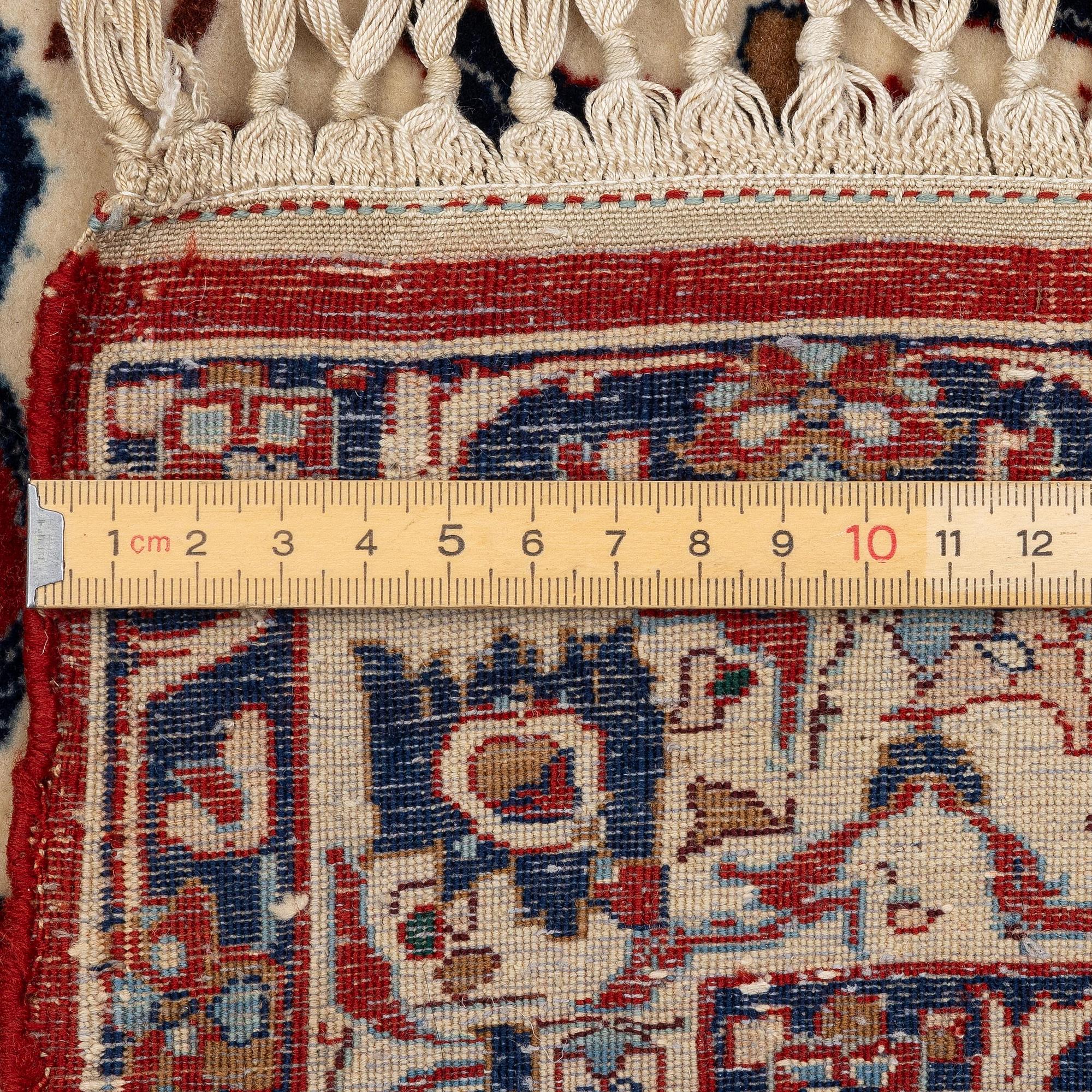 An Isfahan carpet, Central Persia, signed (Hossein) Seirafian, c. 178 x 102 cm.