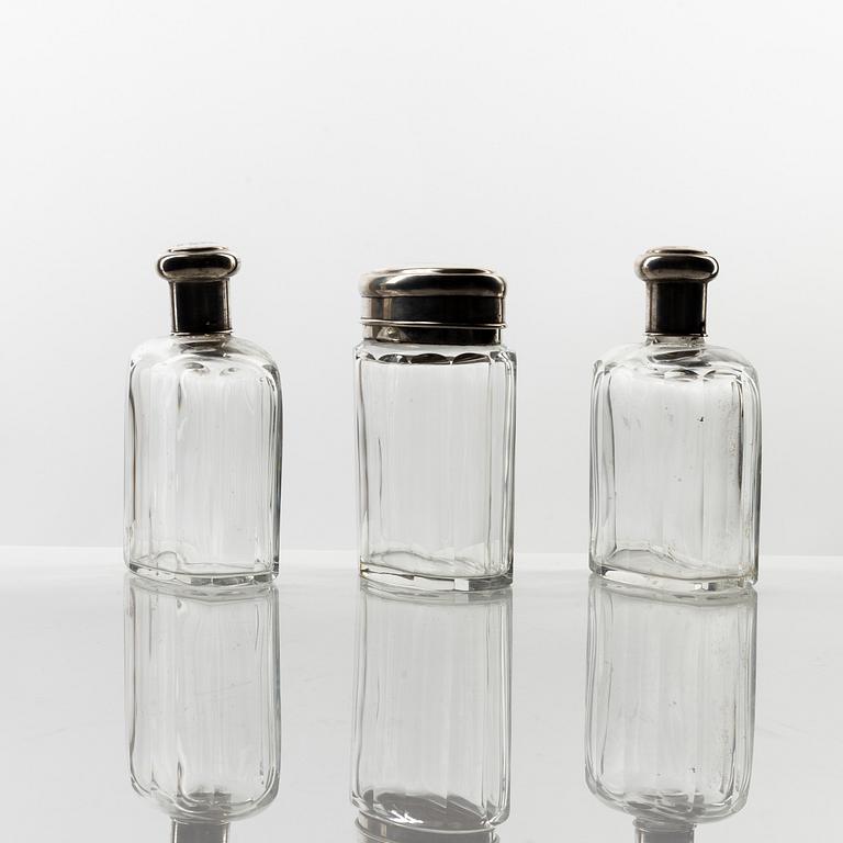 Viktor Lindman, toiletries set, silver and glass, Helsinki 1915-16 (3 pieces).