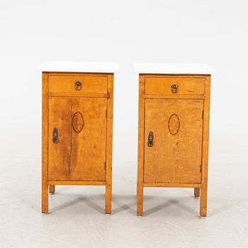 A pair of Art Nouveau bedside tables, early 20th century.