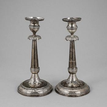 LJUSSTAKAR, ett par, silver, otydliga stämplar, troligen Finland, 1800-tal.