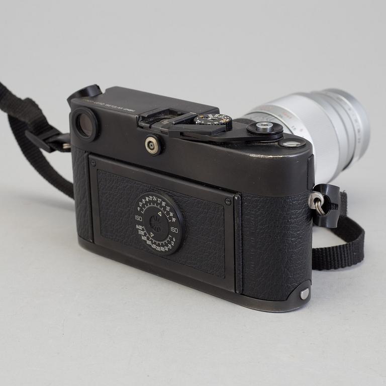A black body Leica M6 no 1725111 from 1987 with Elmar 1:4/135. With original box.