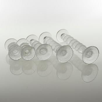 Five glass candlesticks by Timo Sarpaneva for Iittala, model "Festivo", second half of the 20th century.