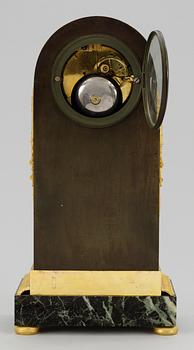A French Empire mantel clock by A. A. Ravrio.