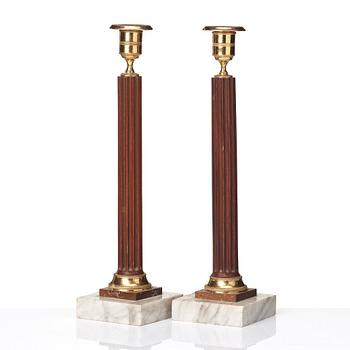 A pair of late Gustavian late 18th century candlesticks.