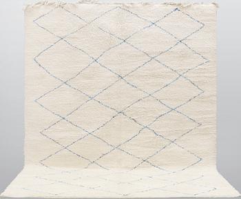 A moroccan carpet, ca 345 x 240 cm.