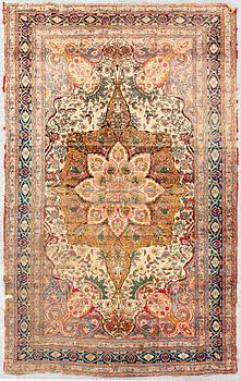An antique Turkish /Hereke) signed carpet ca 200x121 cm.