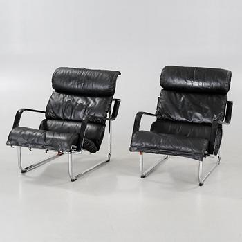 A pair of "Remmi 817H-1K" chairs, designed by Yrjö Kukkapuro in 1969, made by Haimi Oy or Avarte Oy.
