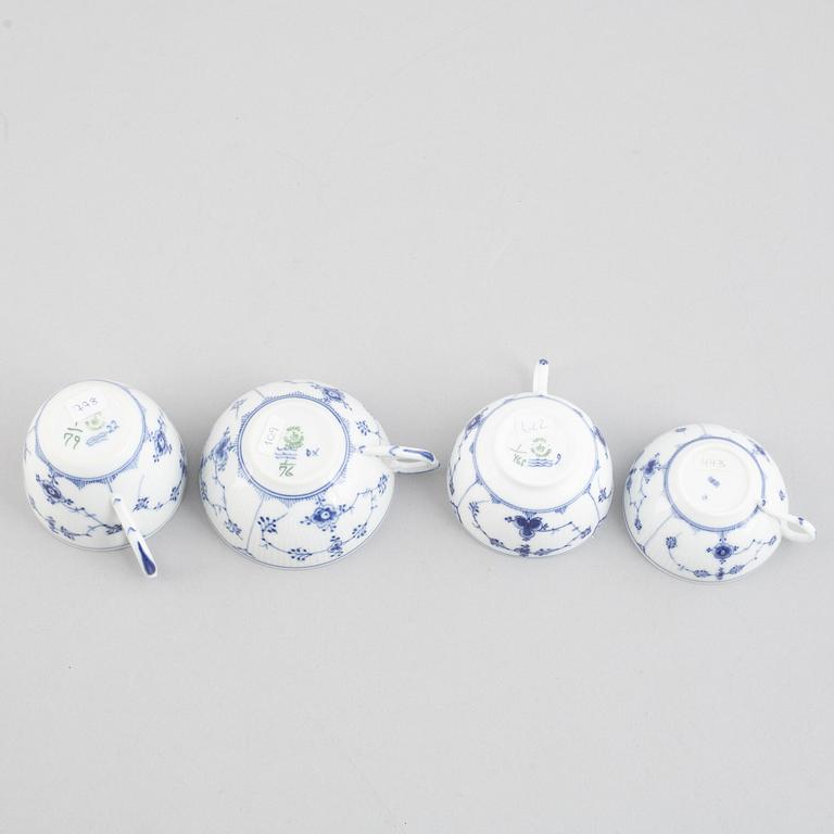 A group of four 'Blue Fluted' / 'Musselmalet rifflet' cups with saucers, Royal Copenhagen, 19th century and later.