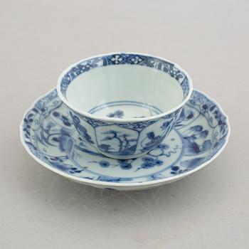 Three (a pair + one) blue and white cups with saucers, China, Kangxi (1662-1722).