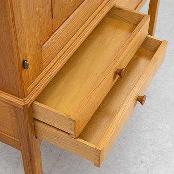 Carl Malmsten, an 'October' oak cabinet, second part of the 20th Century.