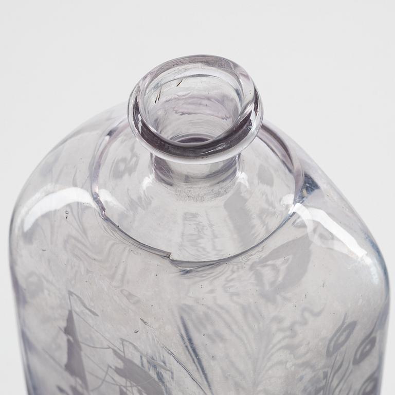 A set of three engraved brandy bottles, partly Cedersbergs glasbruk, 18th/19th century.