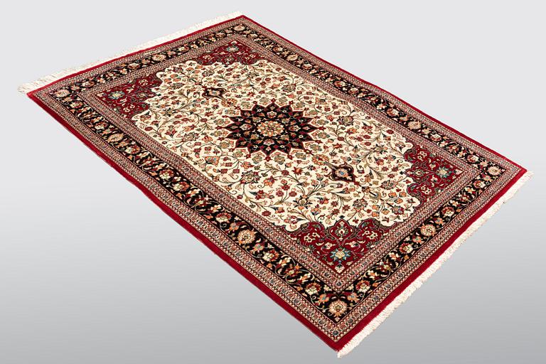 A carpet, Silk Qum, ca 116 x 75 cm.