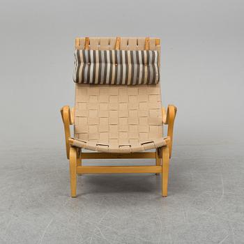 A 'Pernilla' easy chair by Bruno Mathsson for Dux.